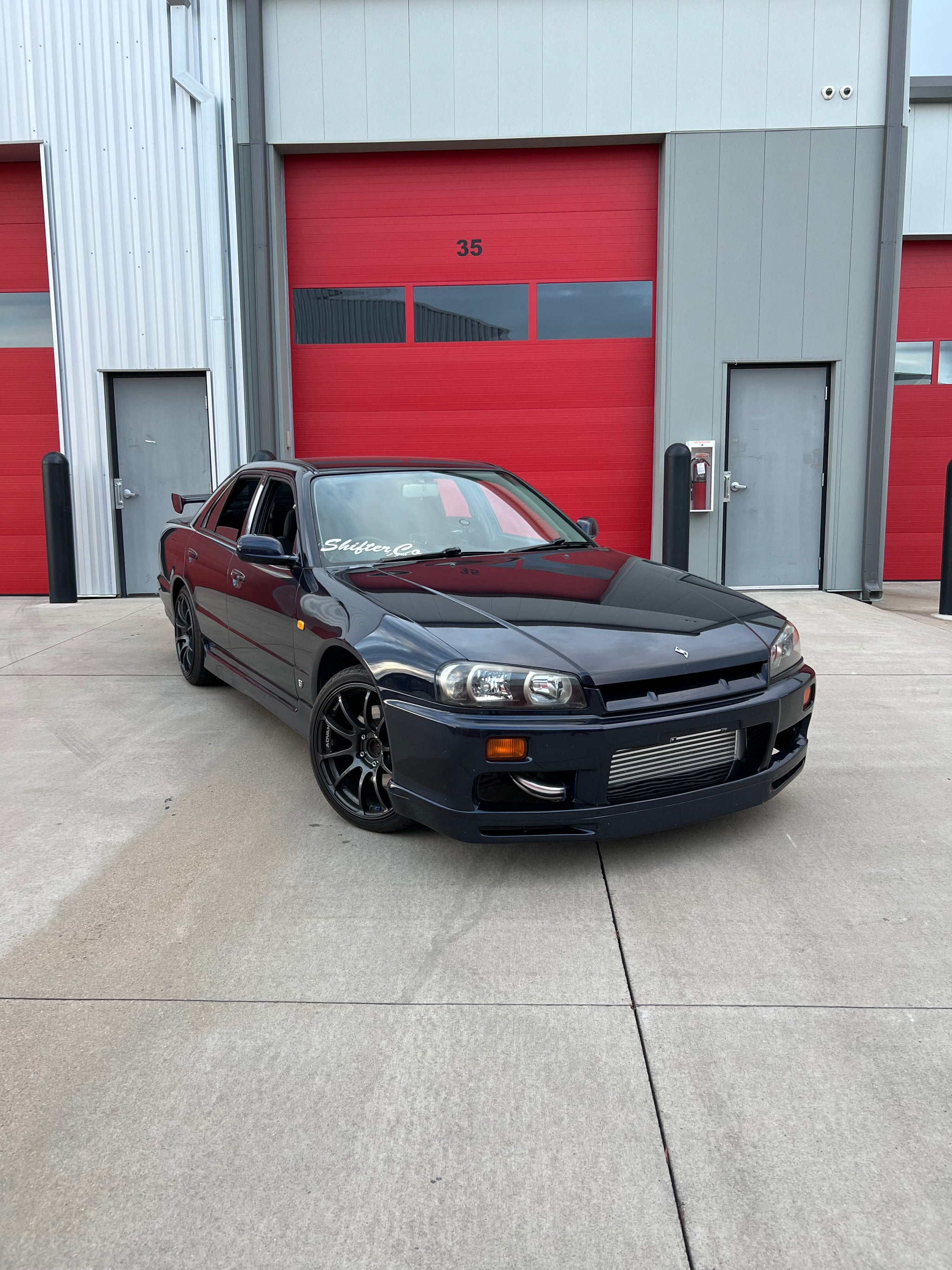 Sold* 1998 Nissan Skyline R34 GTX Turbo Sedan – Shifterco